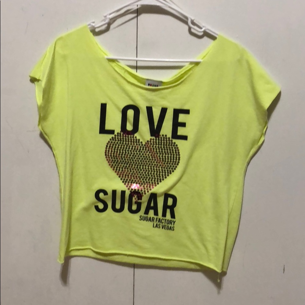 Pink and yellow shirts from Sugar Factory